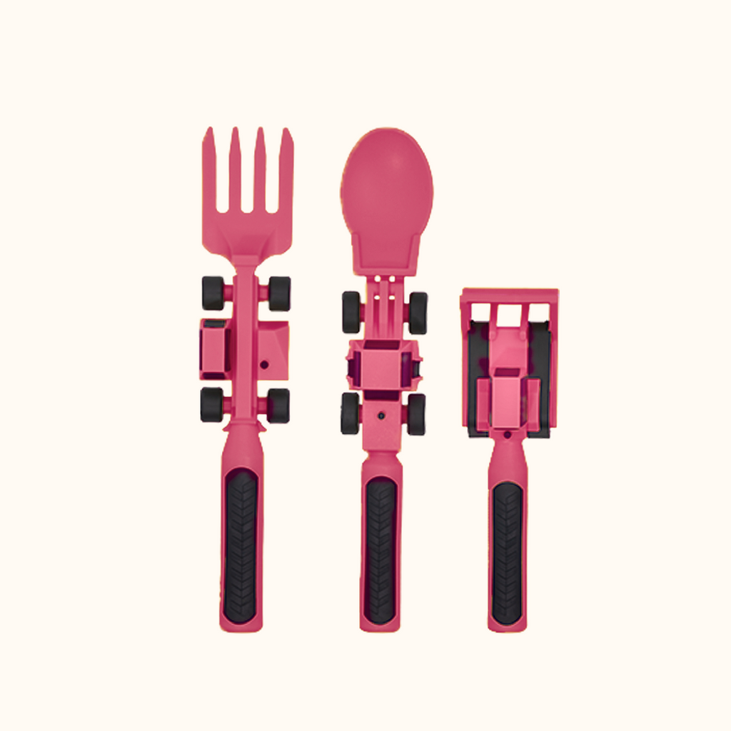 Image of the Construction Utensils in a vertical position. The pink utensils include a bull dozer pusher, a fork lift fork, and a front loader spoon.